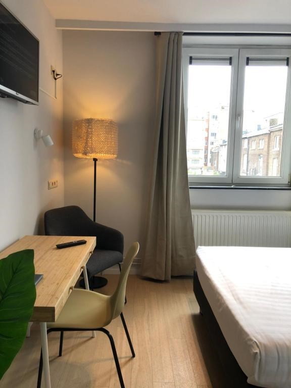 Photo de Hôtel Le Cygne d'Argent